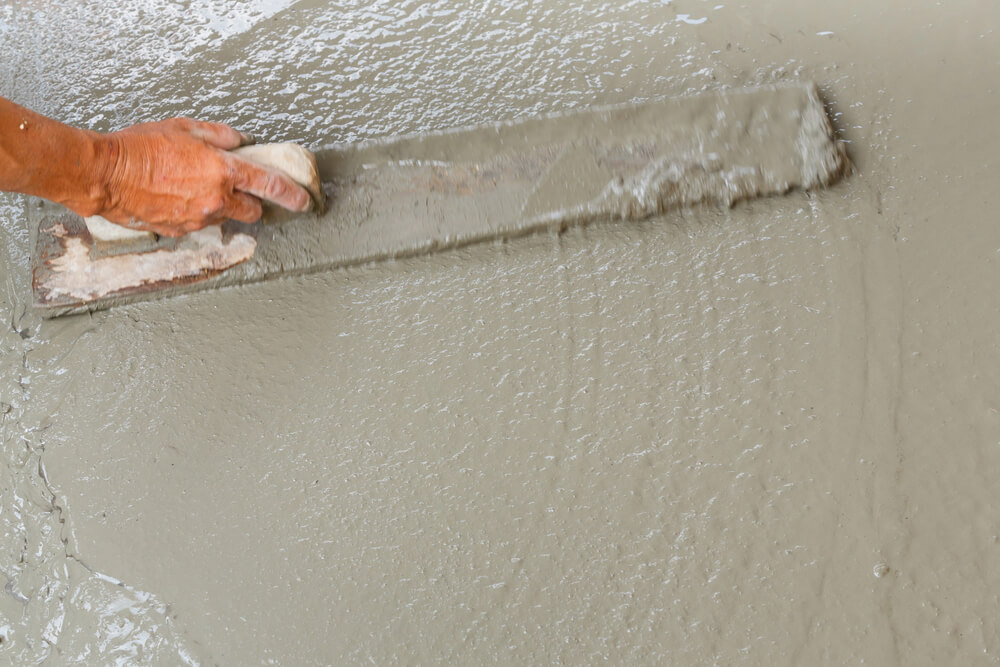using float to level surface of concrete